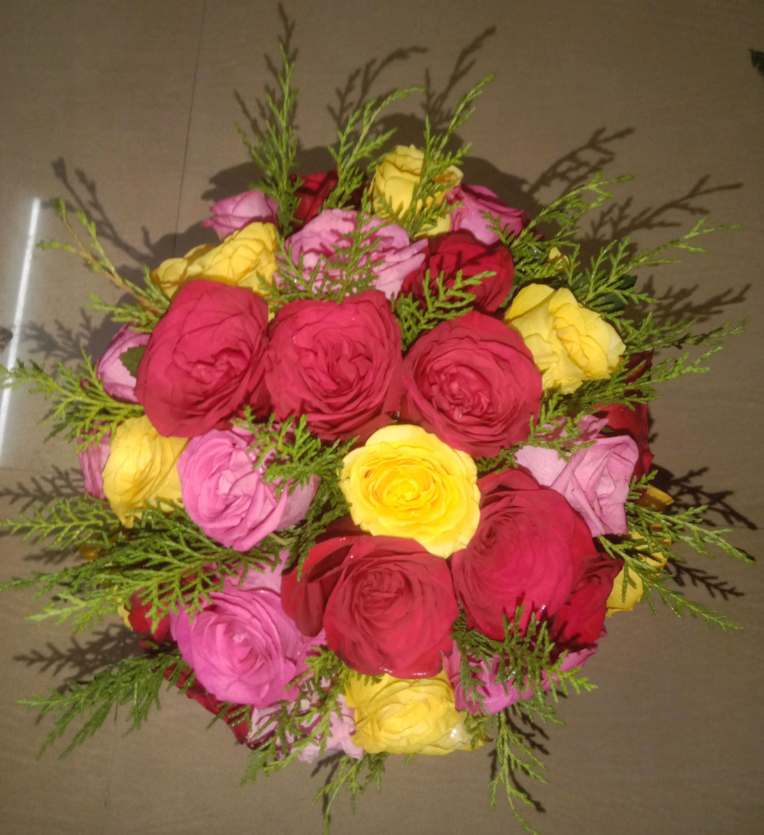 Ravel Pink, Lovely Red and Yellow Roses Basket Arrangement