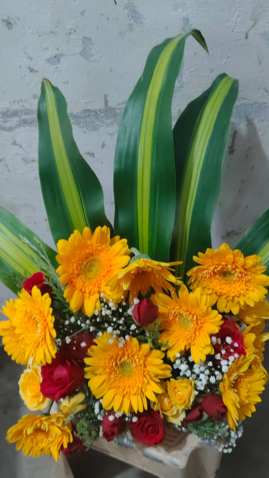Reception Table Welcome Bouquet – Yellow Gerbera Flowers & Red Roses with Green Leaves Arrangement