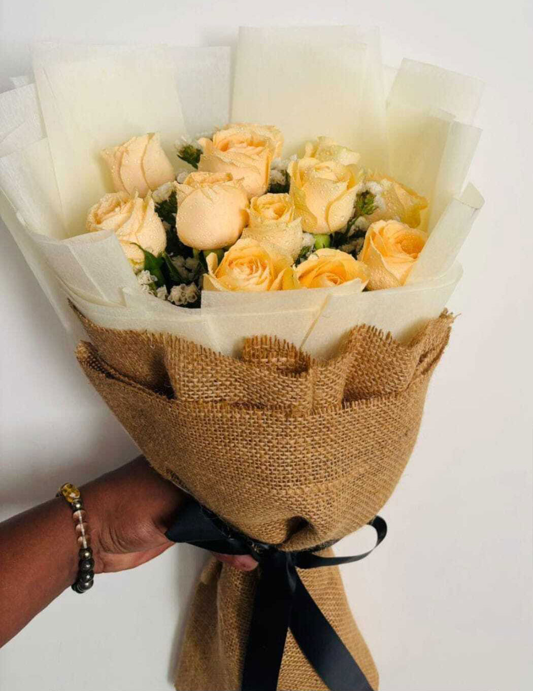 Elegant Cream Rose Bouquet with Rustic Wrap